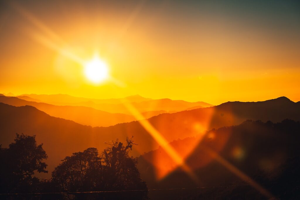 sun setting over the mountains